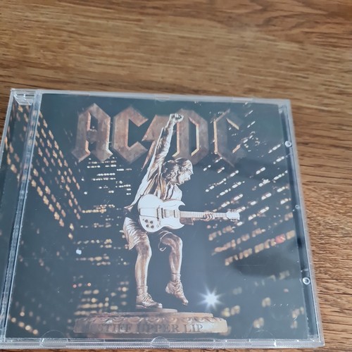 Stiff upper lip von - von, ac/dc