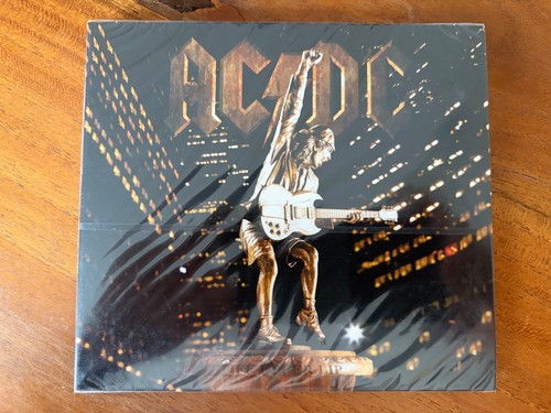 Stiff upper lip - -, cd