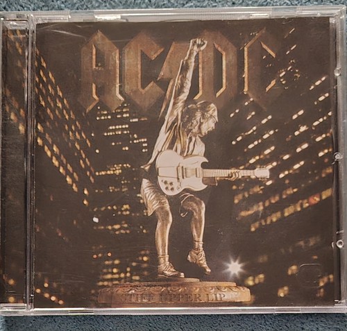 Stiff upper lip von dc - lip,